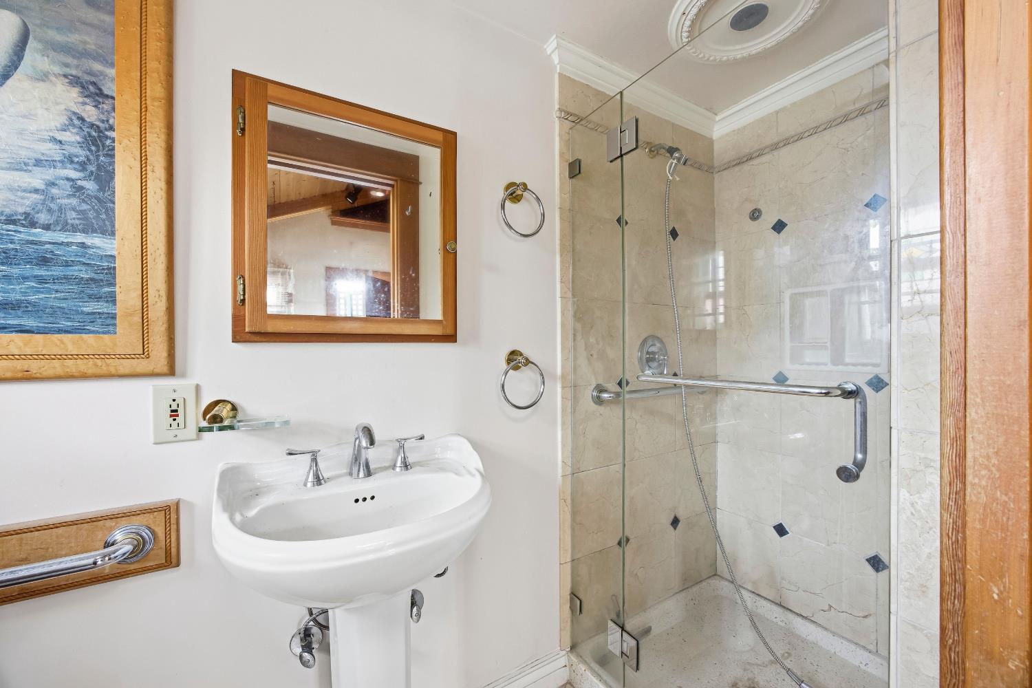 2013 Ninth Street Berkeley, CA 94710 - Photo 15 of 38 a bathroom with a sink mirror and shower