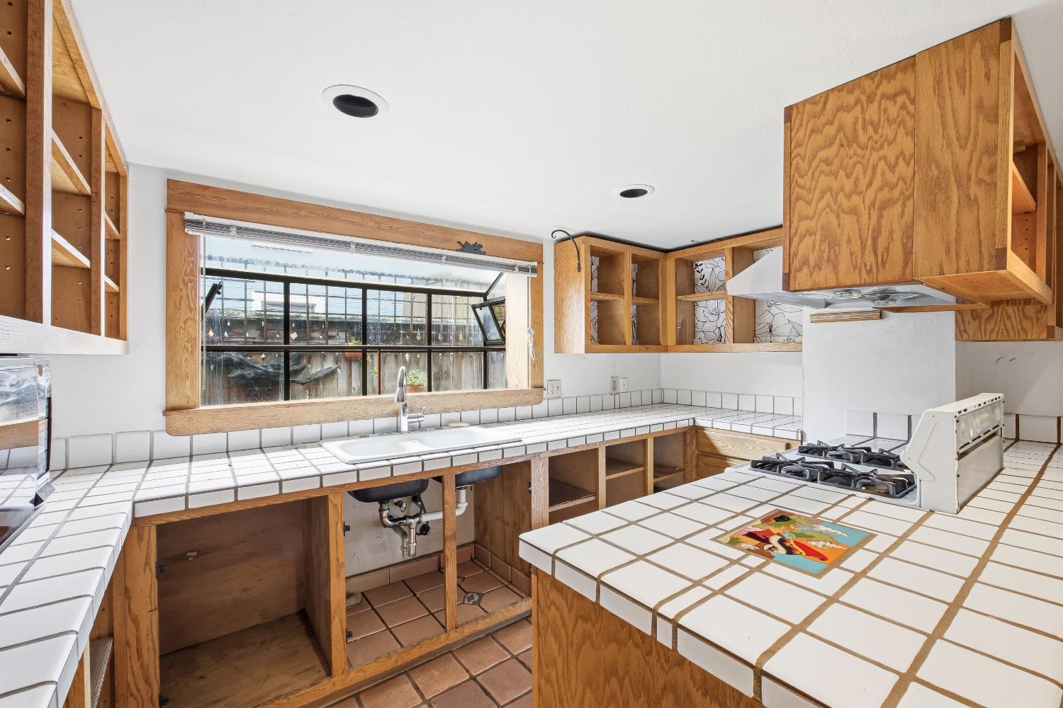 2013 Ninth Street Berkeley, CA 94710 - Photo 19 of 38 a large kitchen with a table and chairs in it