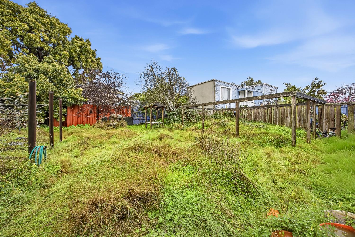 2013 Ninth Street Berkeley, CA 94710 - Photo 36 of 38 a view of a large garden with an buildings in the background