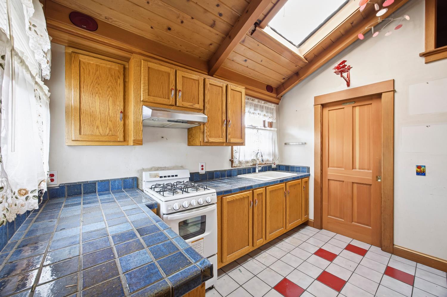 2013 Ninth Street Berkeley, CA 94710 - Photo 8 of 38 a kitchen with stainless steel appliances granite countertop a stove a sink and a refrigerator