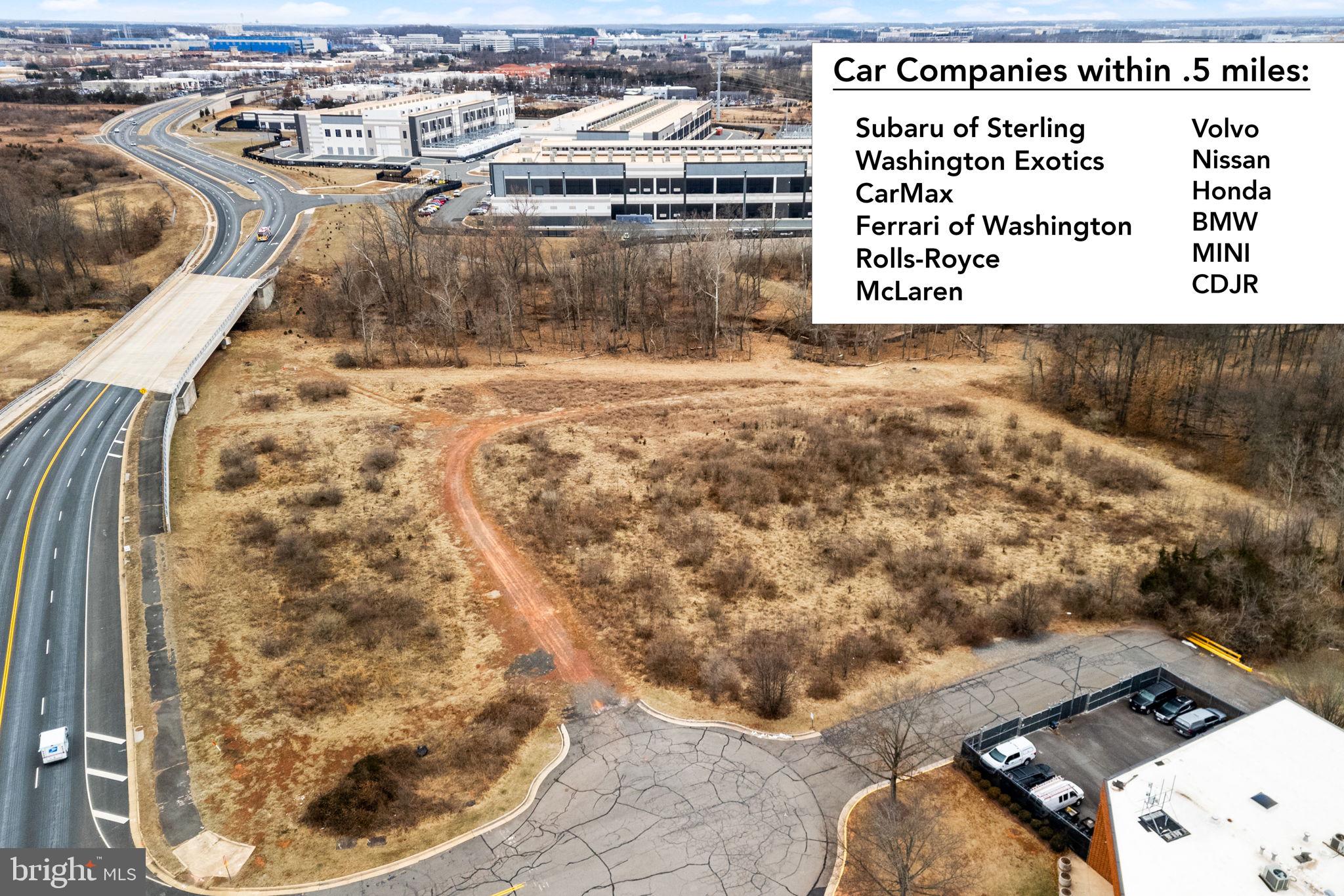 Tbd Sterling, VA 20166 - Photo 11 of 18 a picture of a bench in a lake