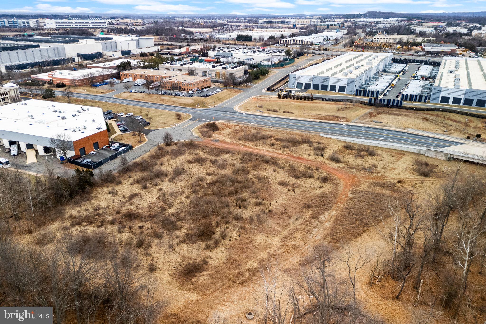 Tbd Sterling, VA 20166 - Photo 9 of 18 an aerial view of residential houses with outdoor space