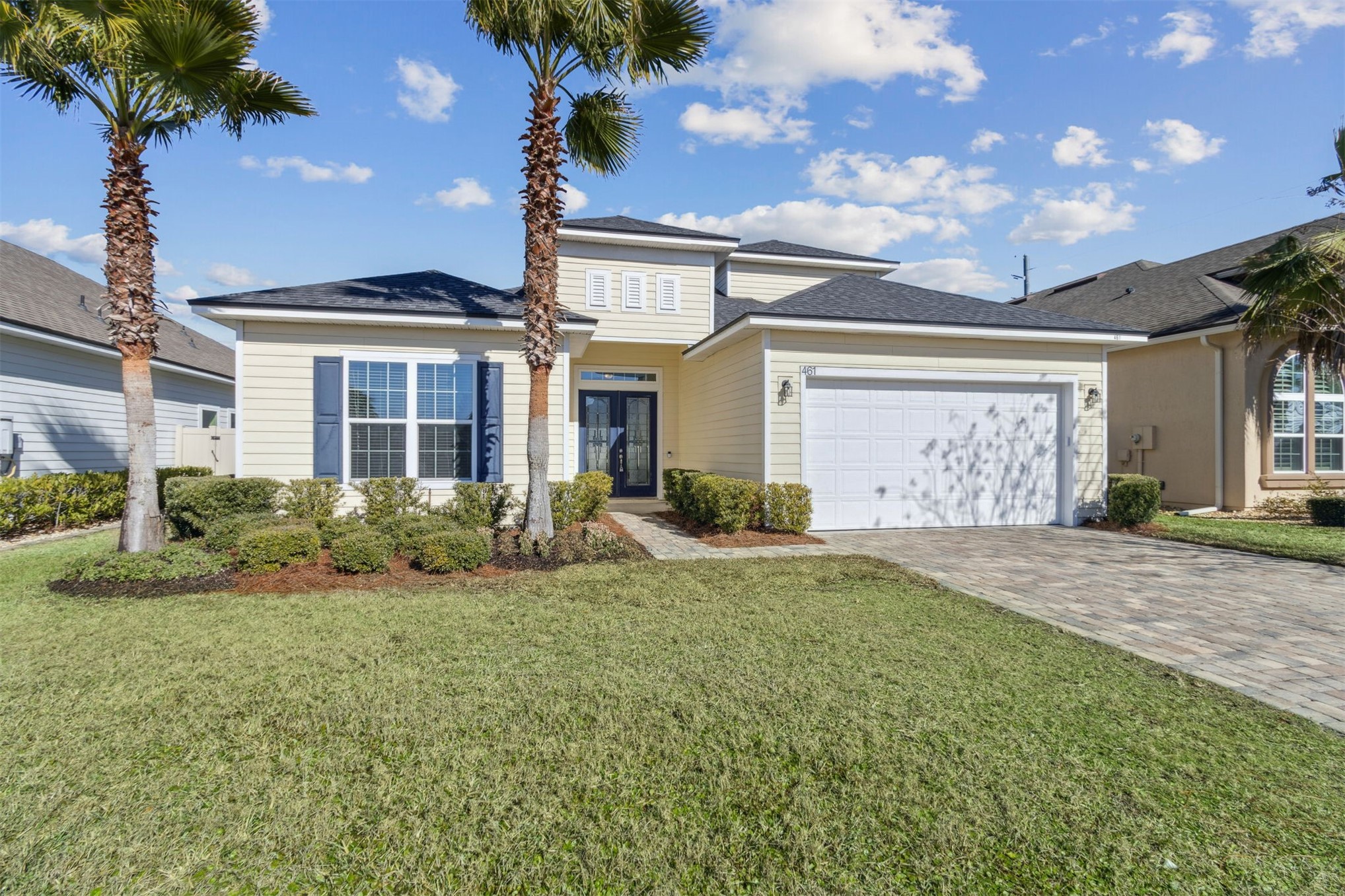 461 Sargasso Street Fernandina Beach, FL 32034 - Photo 13 of 40 a front view of a house with garden