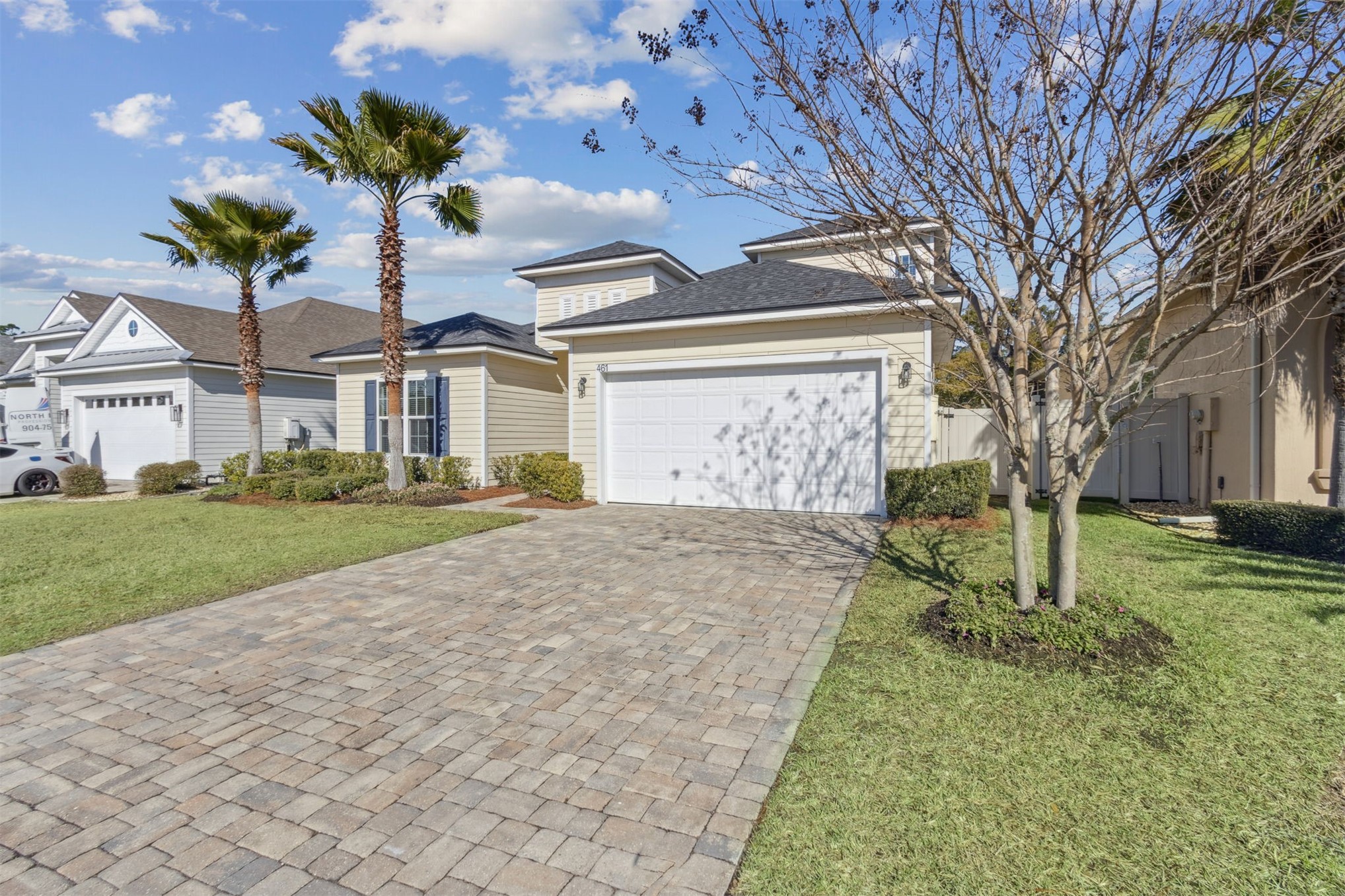 461 Sargasso Street Fernandina Beach, FL 32034 - Photo 14 of 40 a front view of a house with garden