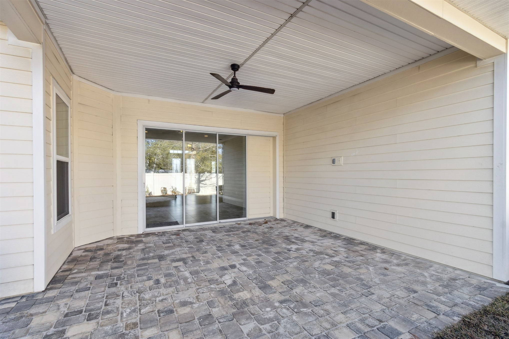 461 Sargasso Street Fernandina Beach, FL 32034 - Photo 21 of 40 a view of empty room with wooden floor and fan