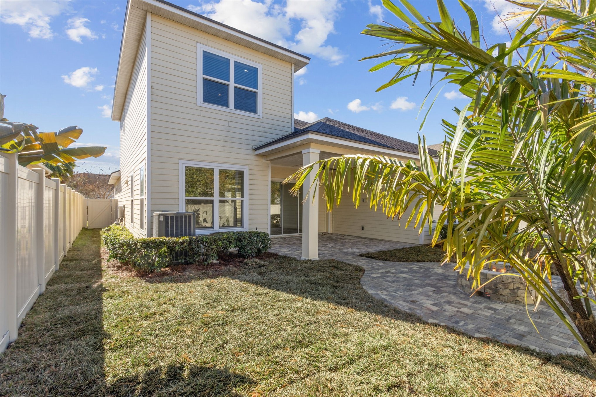 461 Sargasso Street Fernandina Beach, FL 32034 - Photo 22 of 40 a front view of a house with garden