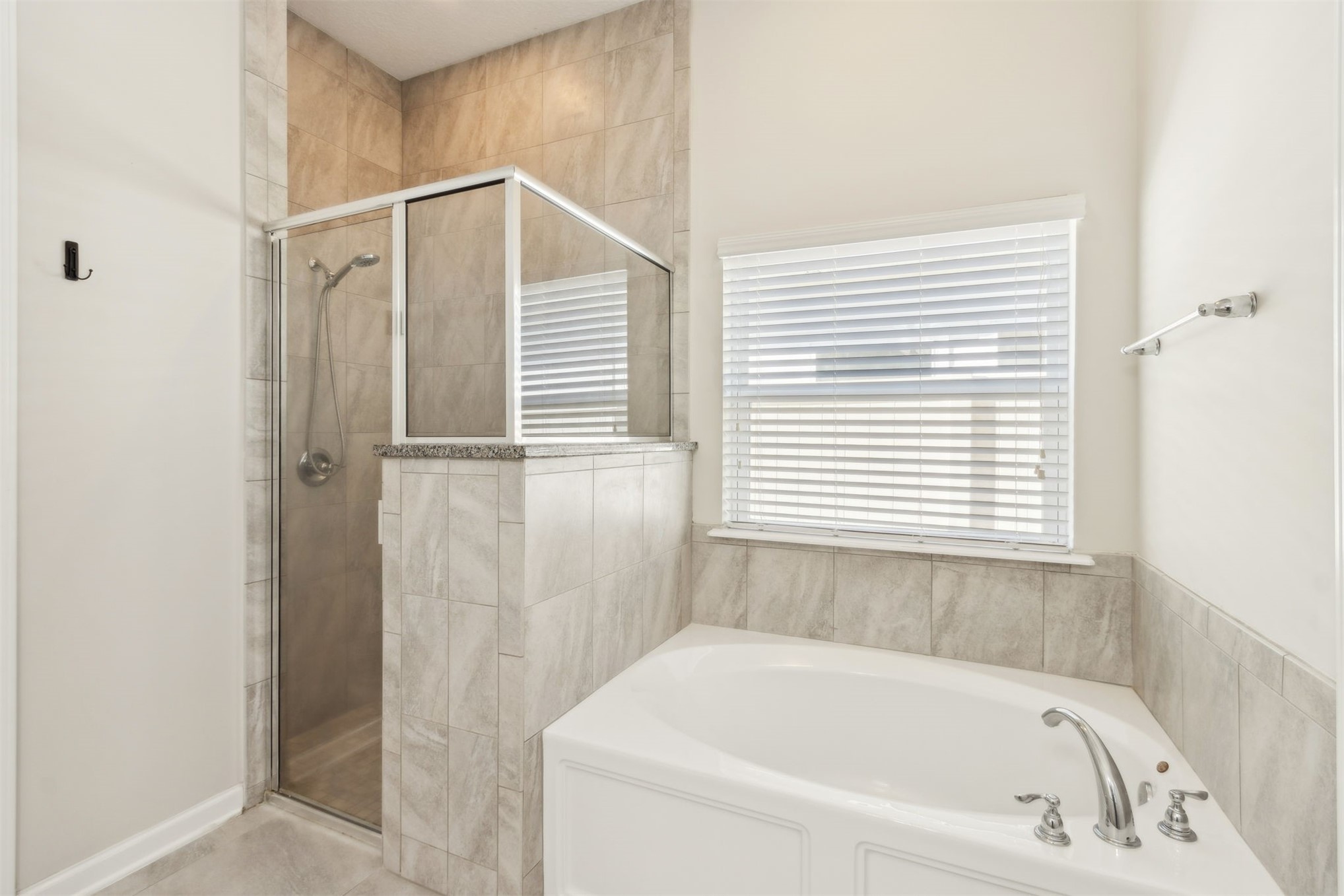 461 Sargasso Street Fernandina Beach, FL 32034 - Photo 26 of 40 a bathroom with a bathtub and a shower