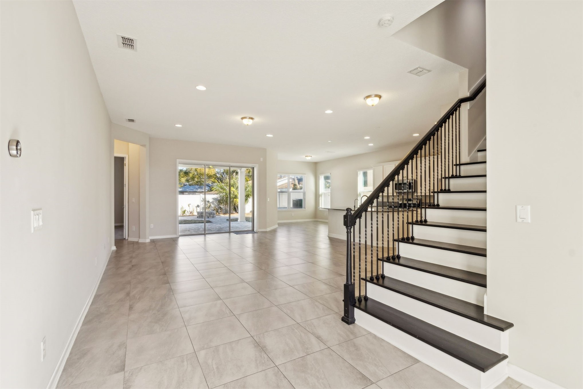 461 Sargasso Street Fernandina Beach, FL 32034 - Photo 36 of 40 a view of entryway and hall with wooden floor