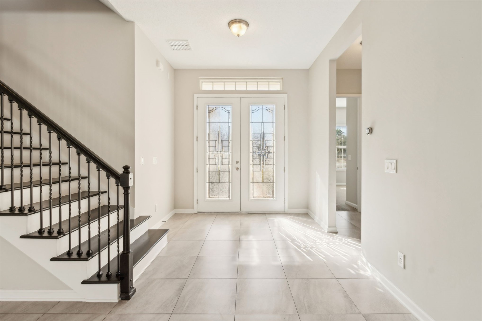 461 Sargasso Street Fernandina Beach, FL 32034 - Photo 4 of 40 a view of an entryway with wooden floor