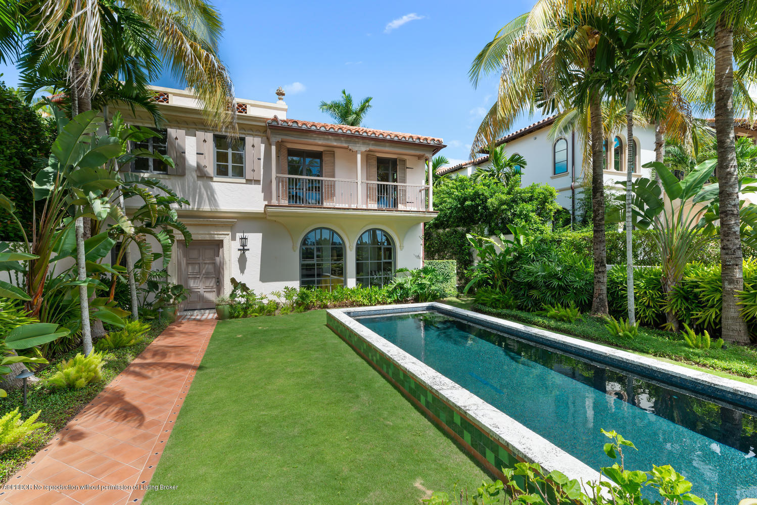 9 Golfview Road Palm Beach, FL 33480 - Photo 2 of 57 a front view of house with yard and swimming pool