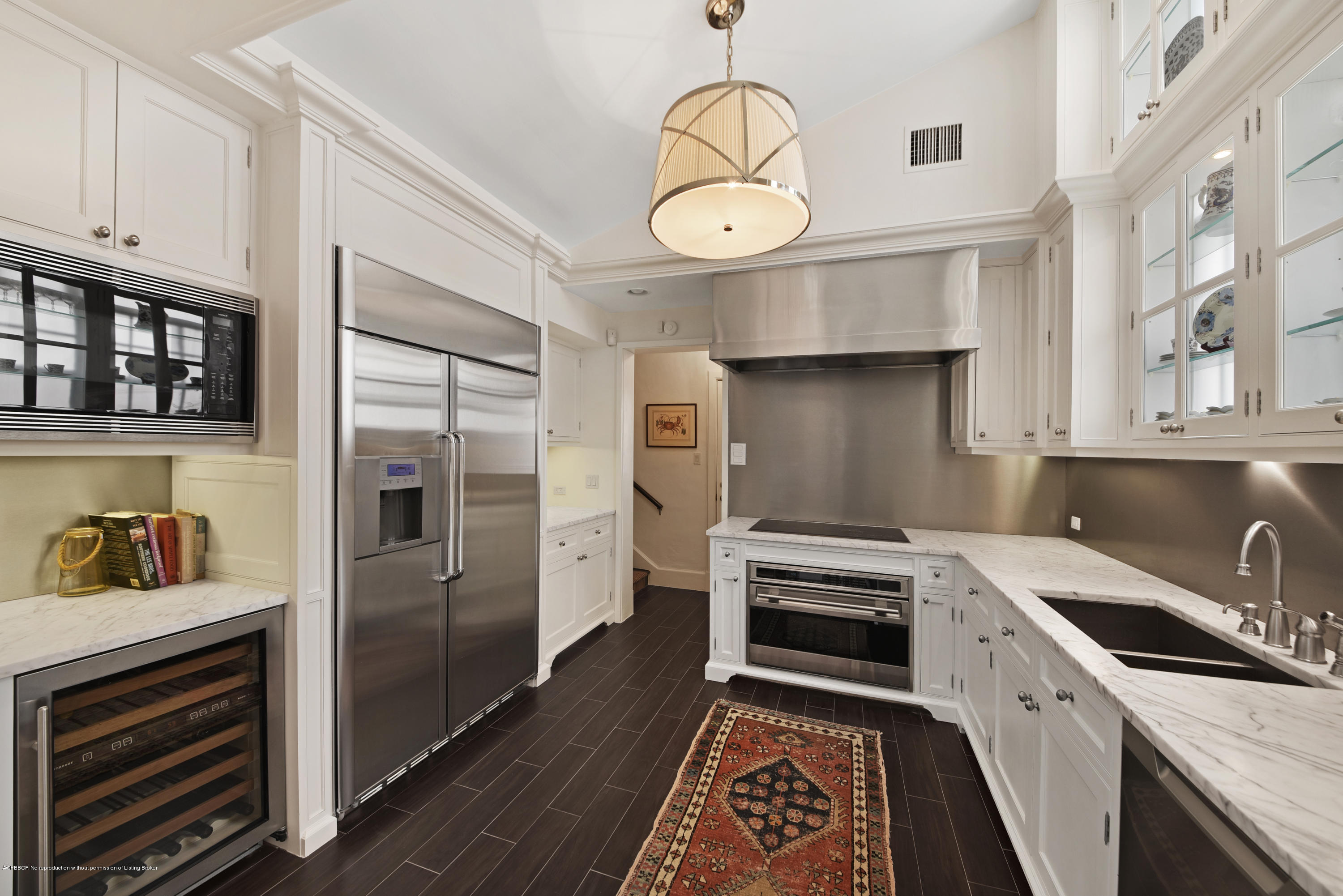 9 Golfview Road Palm Beach, FL 33480 - Photo 18 of 57 a kitchen with granite countertop stainless steel appliances a stove refrigerator and cabinets