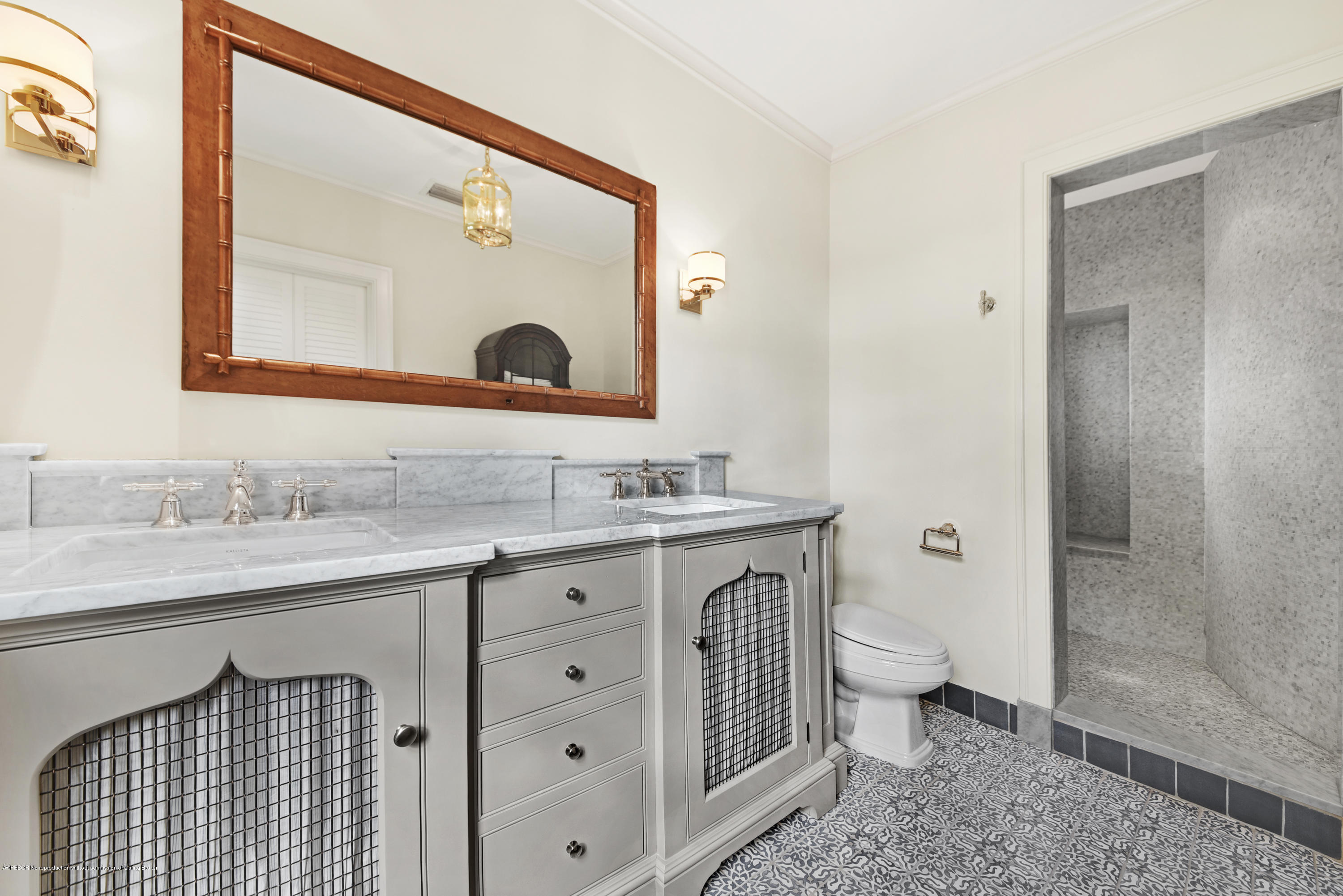 9 Golfview Road Palm Beach, FL 33480 - Photo 23 of 57 a bathroom with a sink a toilet and shower