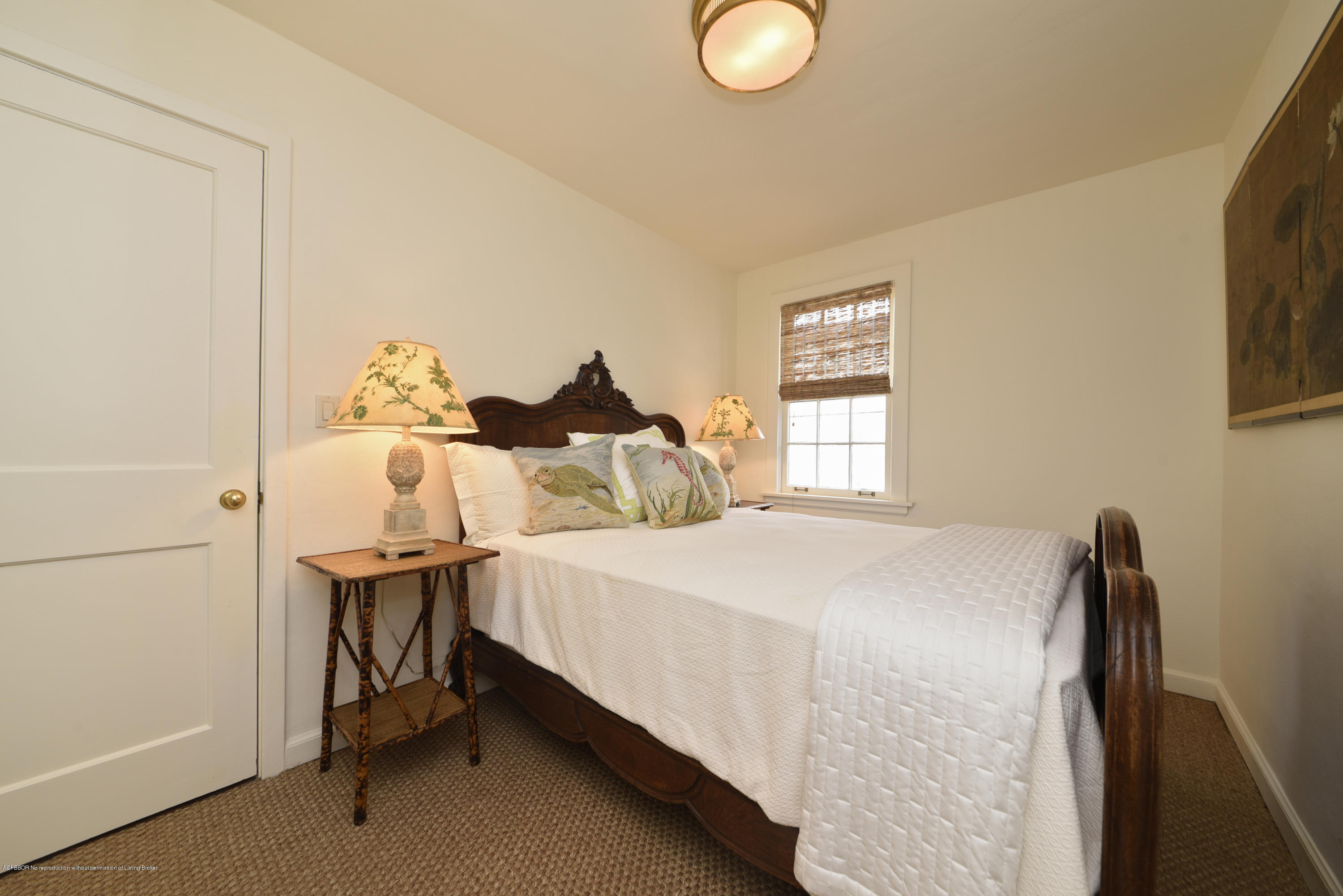 9 Golfview Road Palm Beach, FL 33480 - Photo 28 of 57 a bedroom with a bed and a window