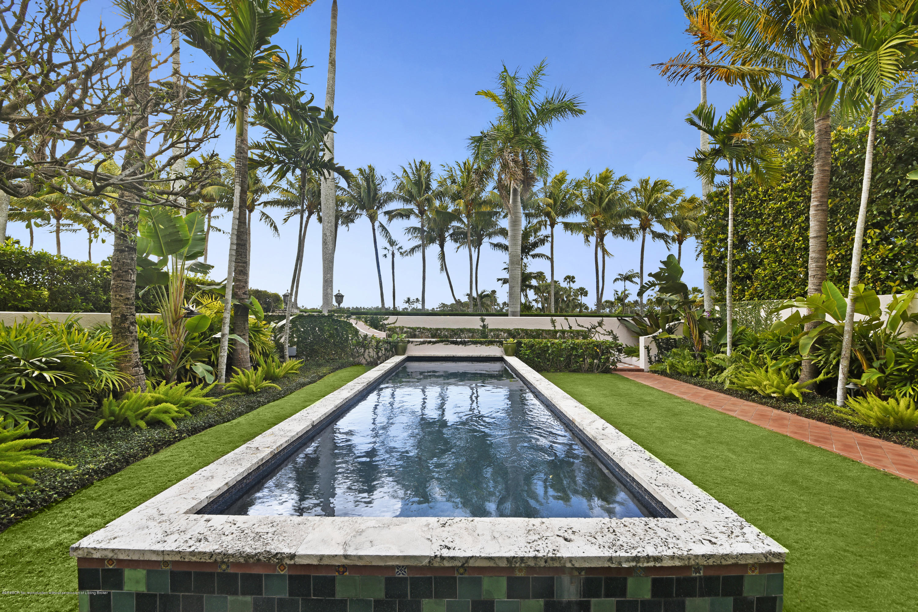 9 Golfview Road Palm Beach, FL 33480 - Photo 32 of 57 a view of swimming pool with a garden