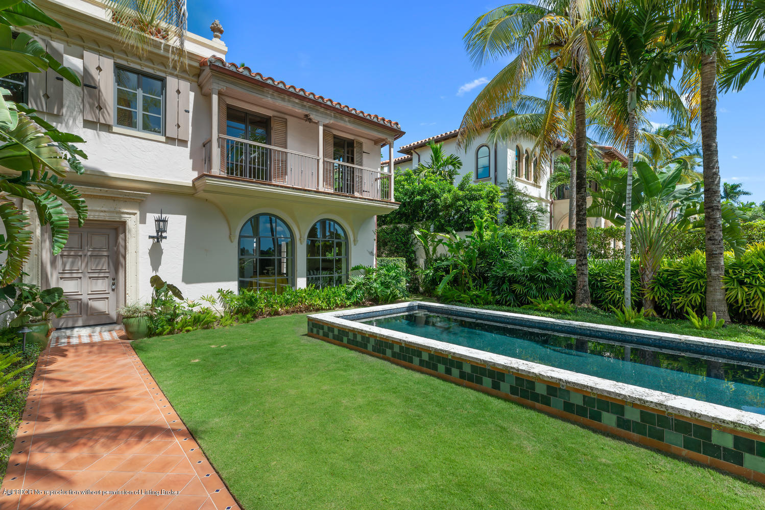 9 Golfview Road Palm Beach, FL 33480 - Photo 48 of 57 a front view of a house with a yard