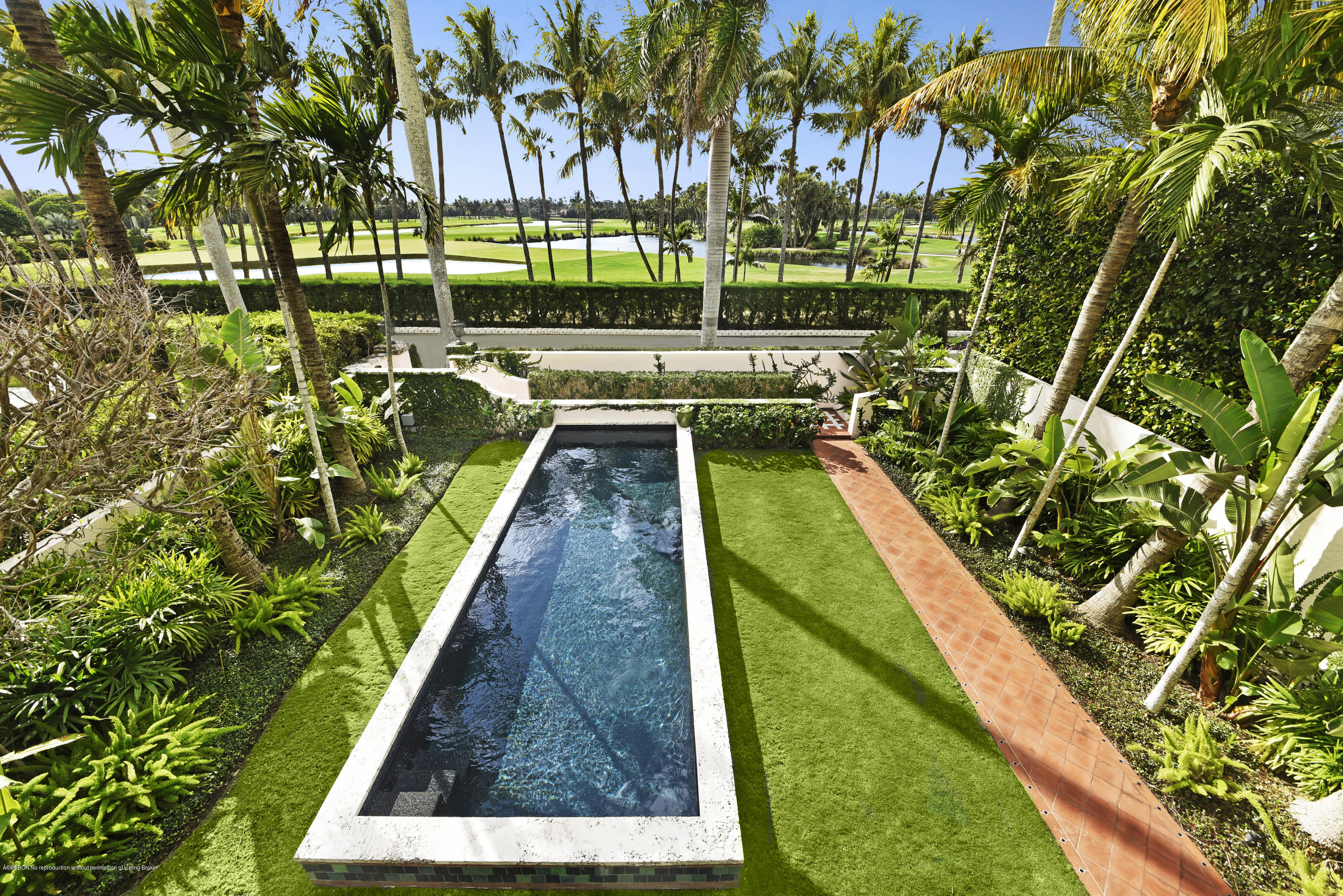 9 Golfview Road Palm Beach, FL 33480 - Photo 8 of 57 swimming pool view with a garden