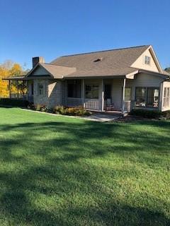 10 Maple Farm Lane Uniontown, PA 15401 - Photo 3 of 21 a front view of a house with a garden