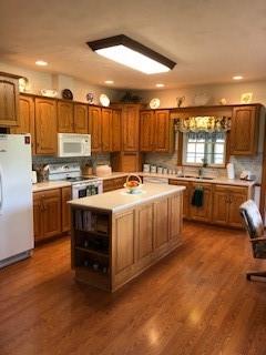 10 Maple Farm Lane Uniontown, PA 15401 - Photo 5 of 21 a kitchen with a stove sink and cabinets