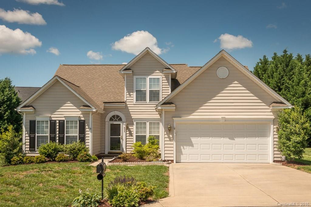 624 Eaton Court Fort Mill, SC 29708 - Photo 1 of 24 a front view of a house with a yard