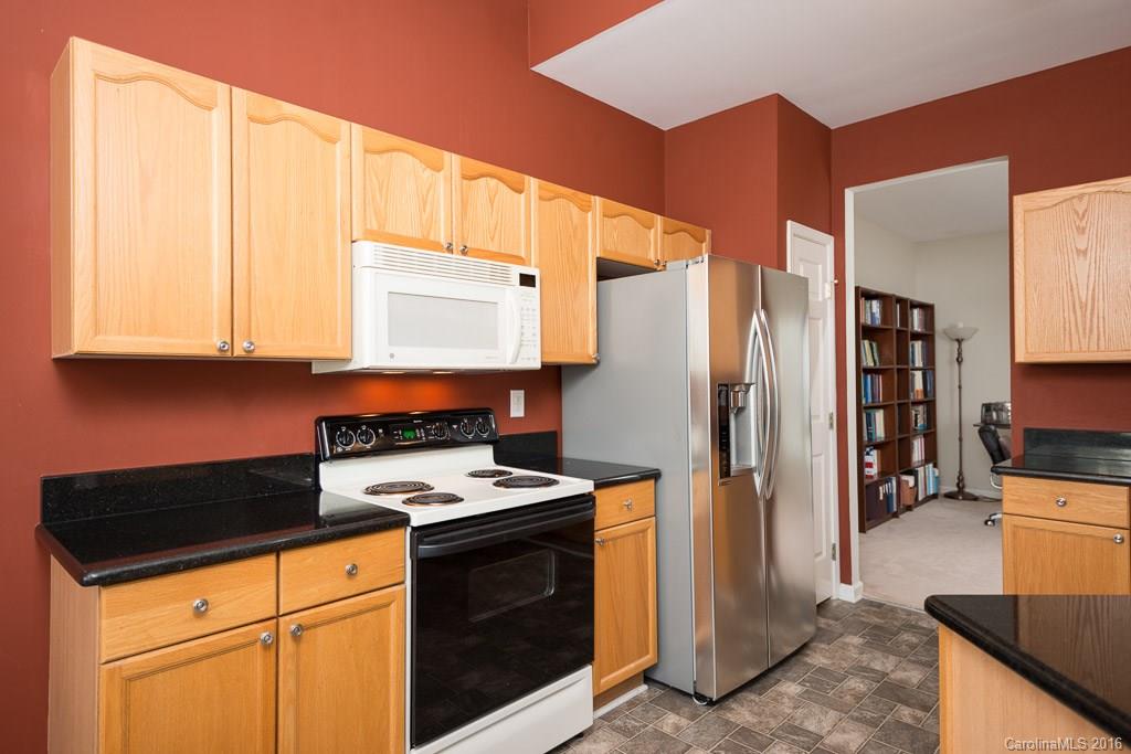 624 Eaton Court Fort Mill, SC 29708 - Photo 2 of 24 a kitchen with stainless steel appliances granite countertop a refrigerator and a stove
