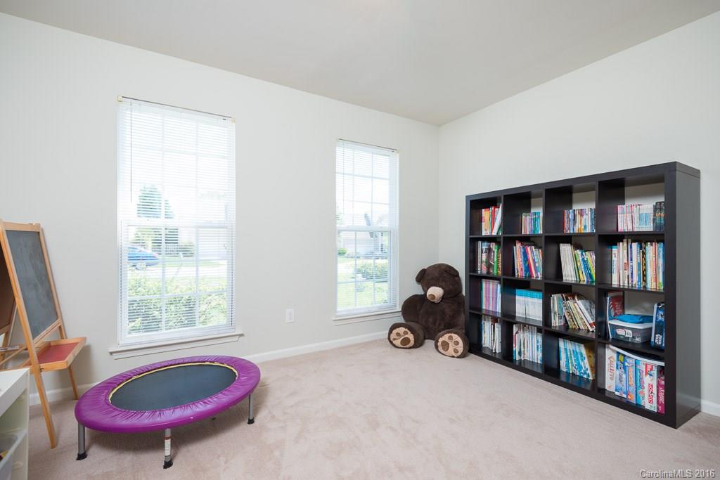 624 Eaton Court Fort Mill, SC 29708 - Photo 15 of 24 a view of a livingroom with furniture and a window