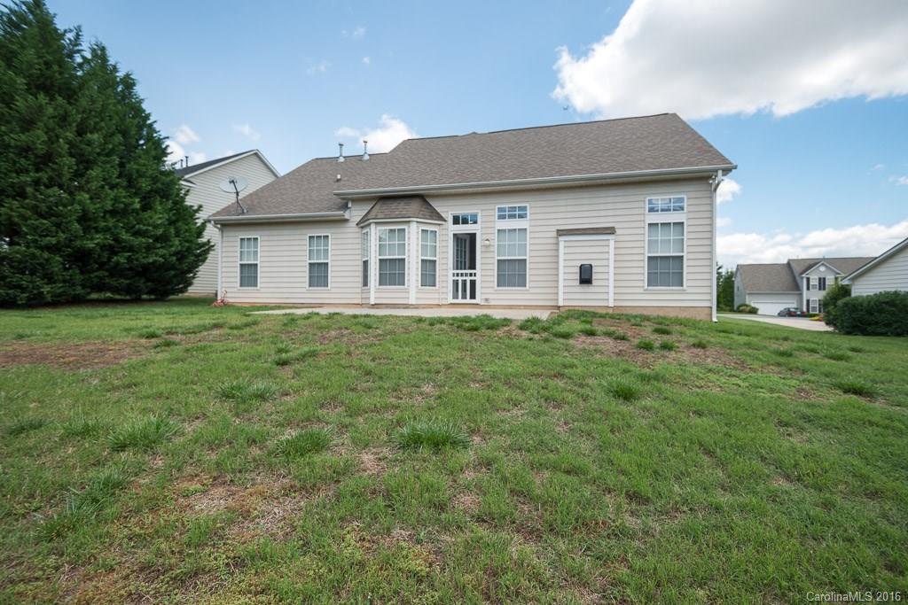 624 Eaton Court Fort Mill, SC 29708 - Photo 18 of 24 a front view of a house with a yard