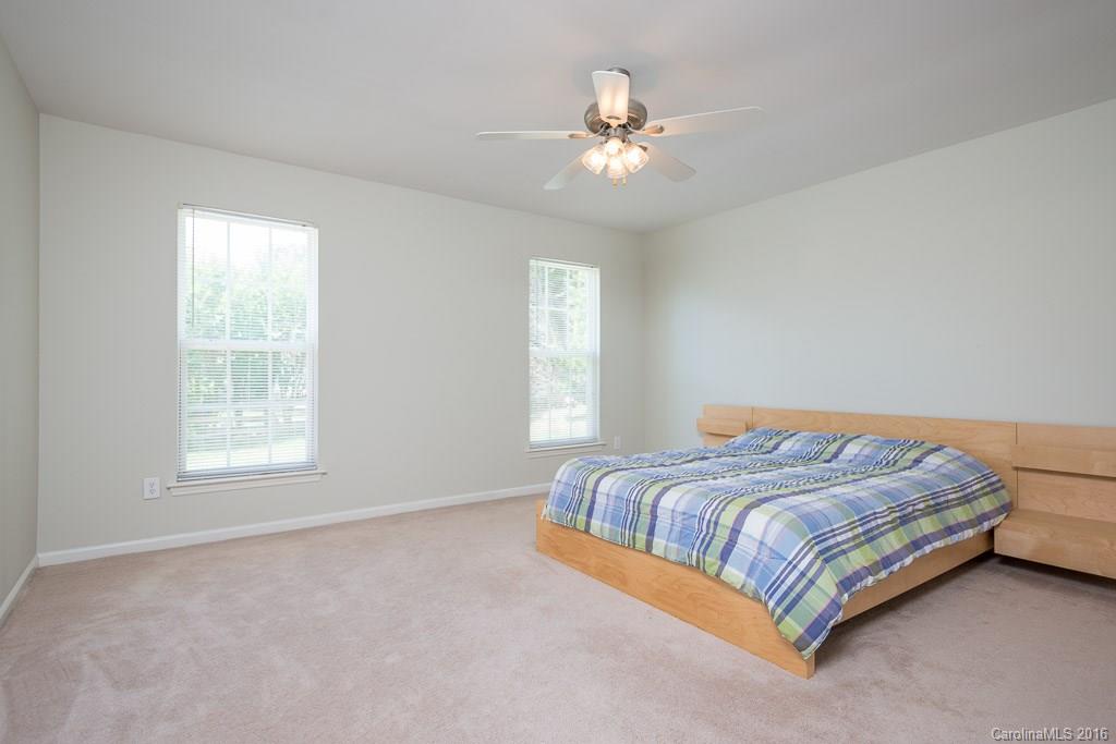 624 Eaton Court Fort Mill, SC 29708 - Photo 10 of 24 a bedroom with a bed and window