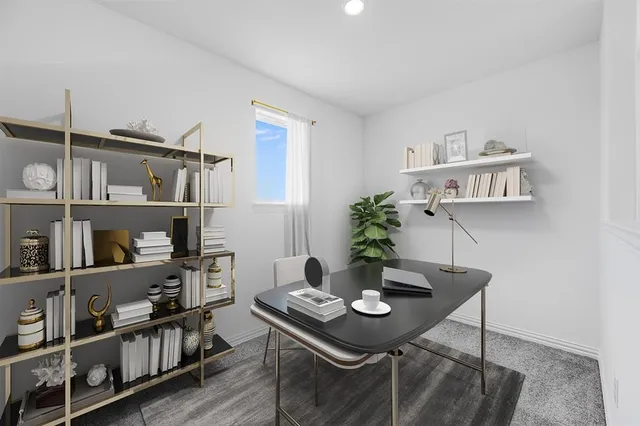 a view of a workspace with furniture