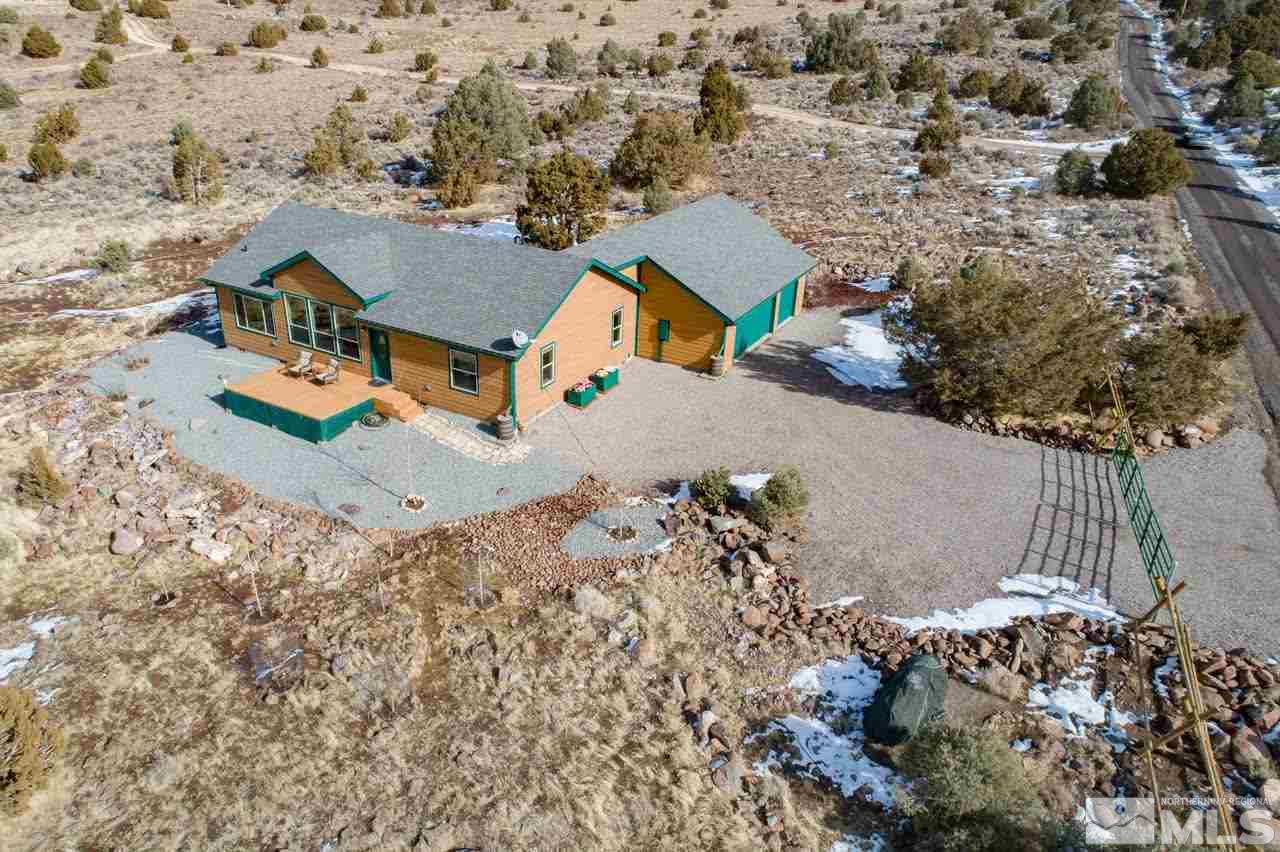3230 Cartwright Road Reno, NV 89521 - Photo 1 of 25 an aerial view of a house with a yard