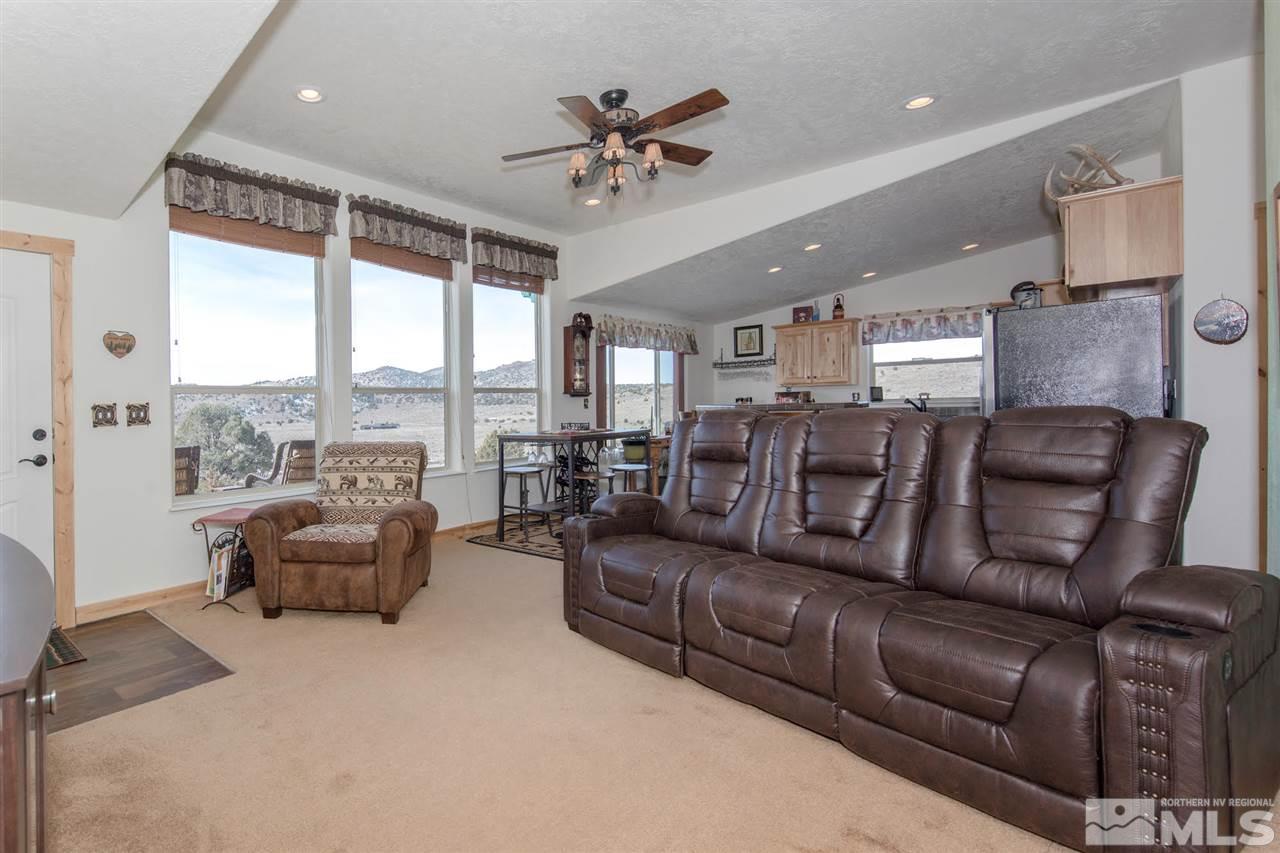 3230 Cartwright Road Reno, NV 89521 - Photo 11 of 25 a living room with furniture and a large window