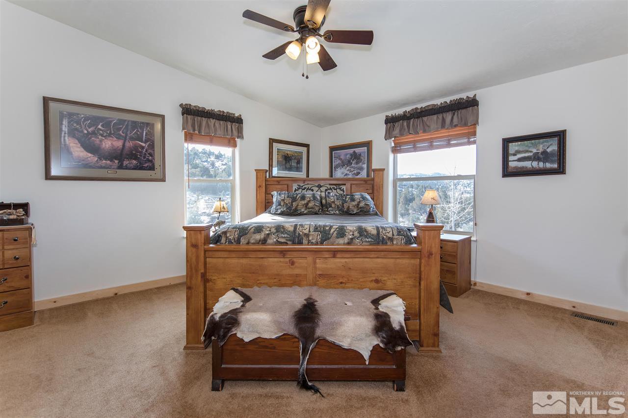 3230 Cartwright Road Reno, NV 89521 - Photo 19 of 25 a room with a table chairs and a window