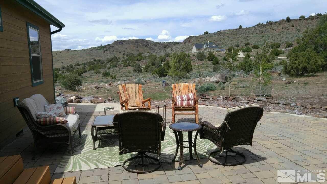 3230 Cartwright Road Reno, NV 89521 - Photo 6 of 25 a view of a chairs and table in the balcony