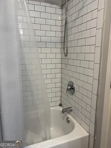 a bathroom with a bathtub