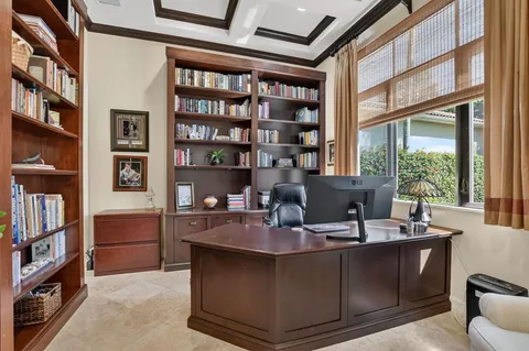 a bedroom with a large bed and a couch