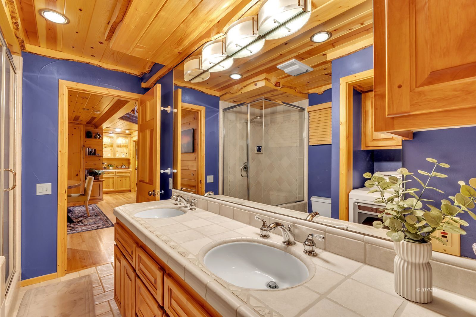26620 Pine Avenue Idyllwild, CA 92549 - Photo 24 of 43 a bathroom with a granite countertop sink and a mirror