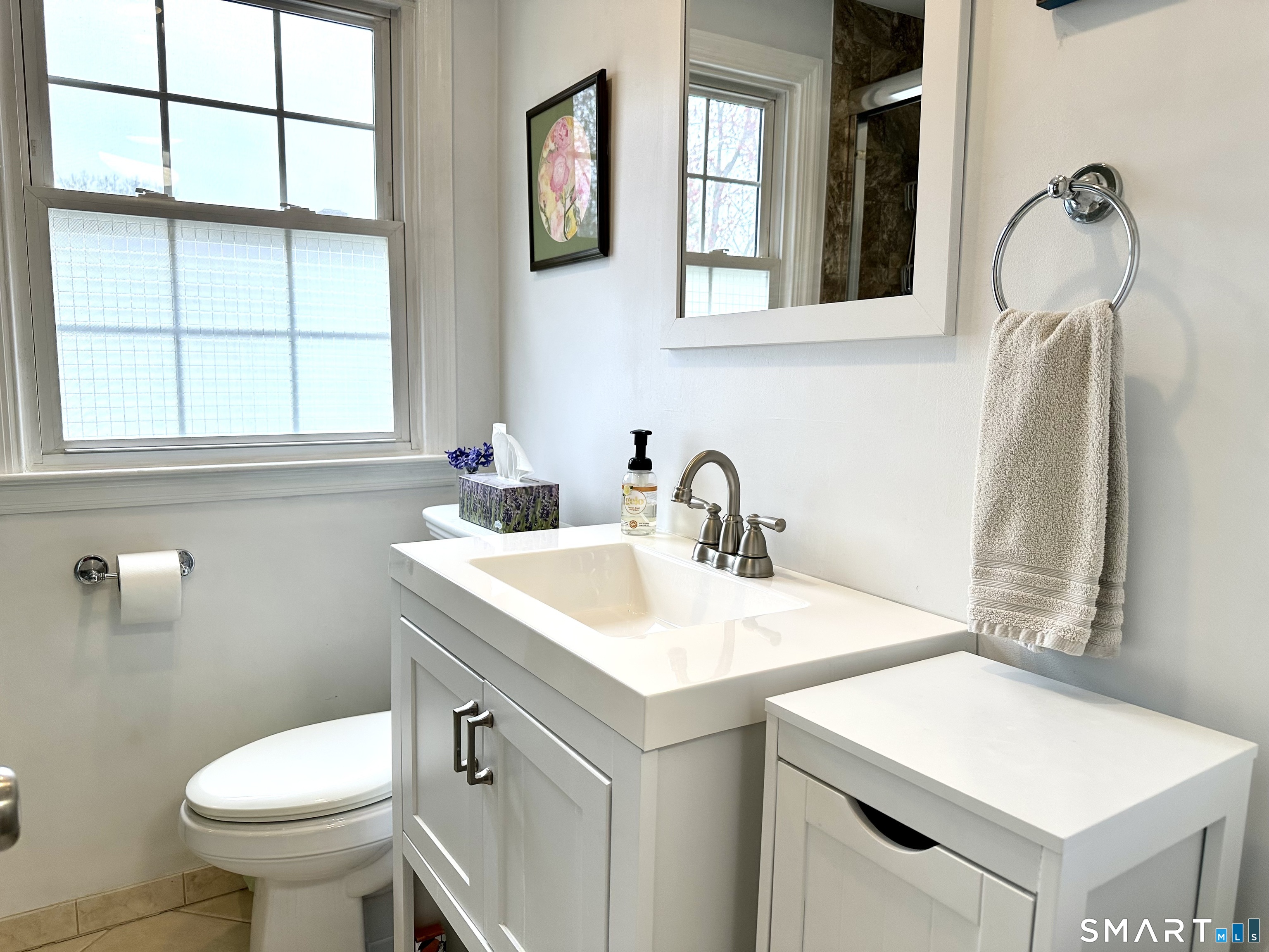 198 Sylvan Knoll Road Stamford, CT 06902 - Photo 9 of 17 a bathroom with a sink and a toilet