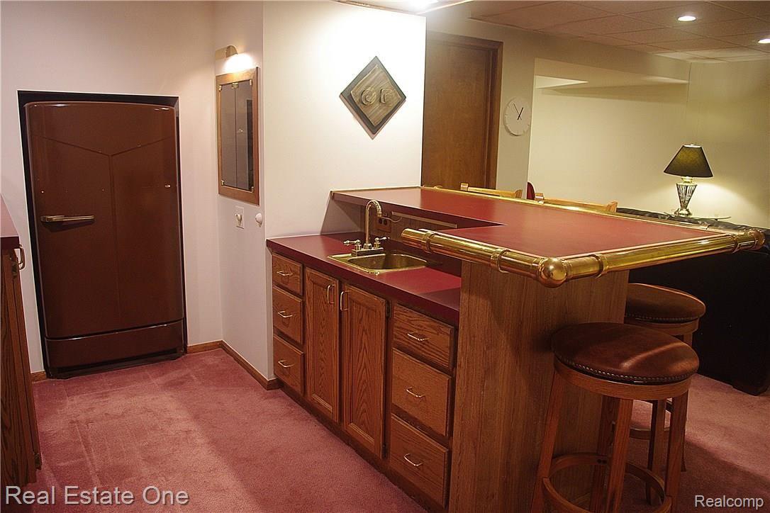 19431 Gill Road Livonia, MI 48152 - Photo 19 of 25 19basement-bar.jpg