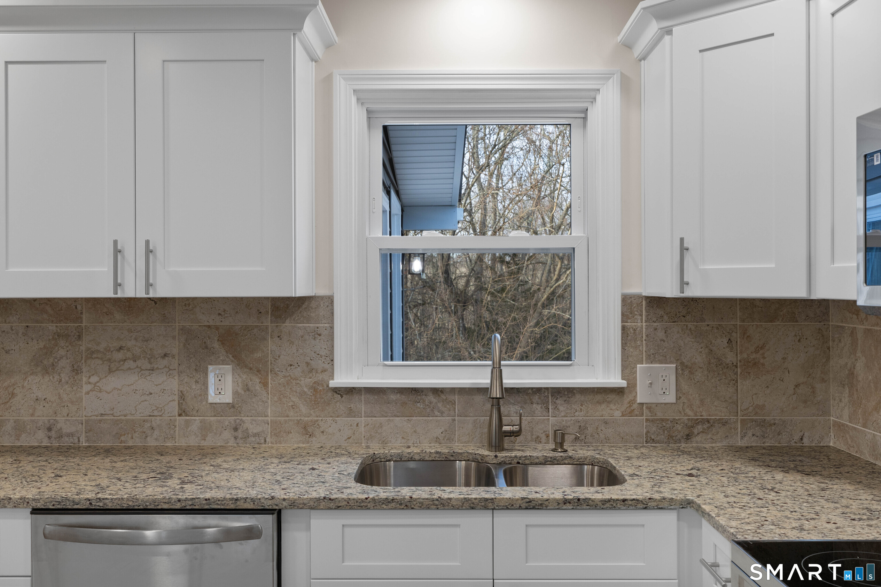 31 Branch Hill Road Preston, CT 06365 - Photo 18 of 40 a kitchen with granite countertop a sink and cabinets