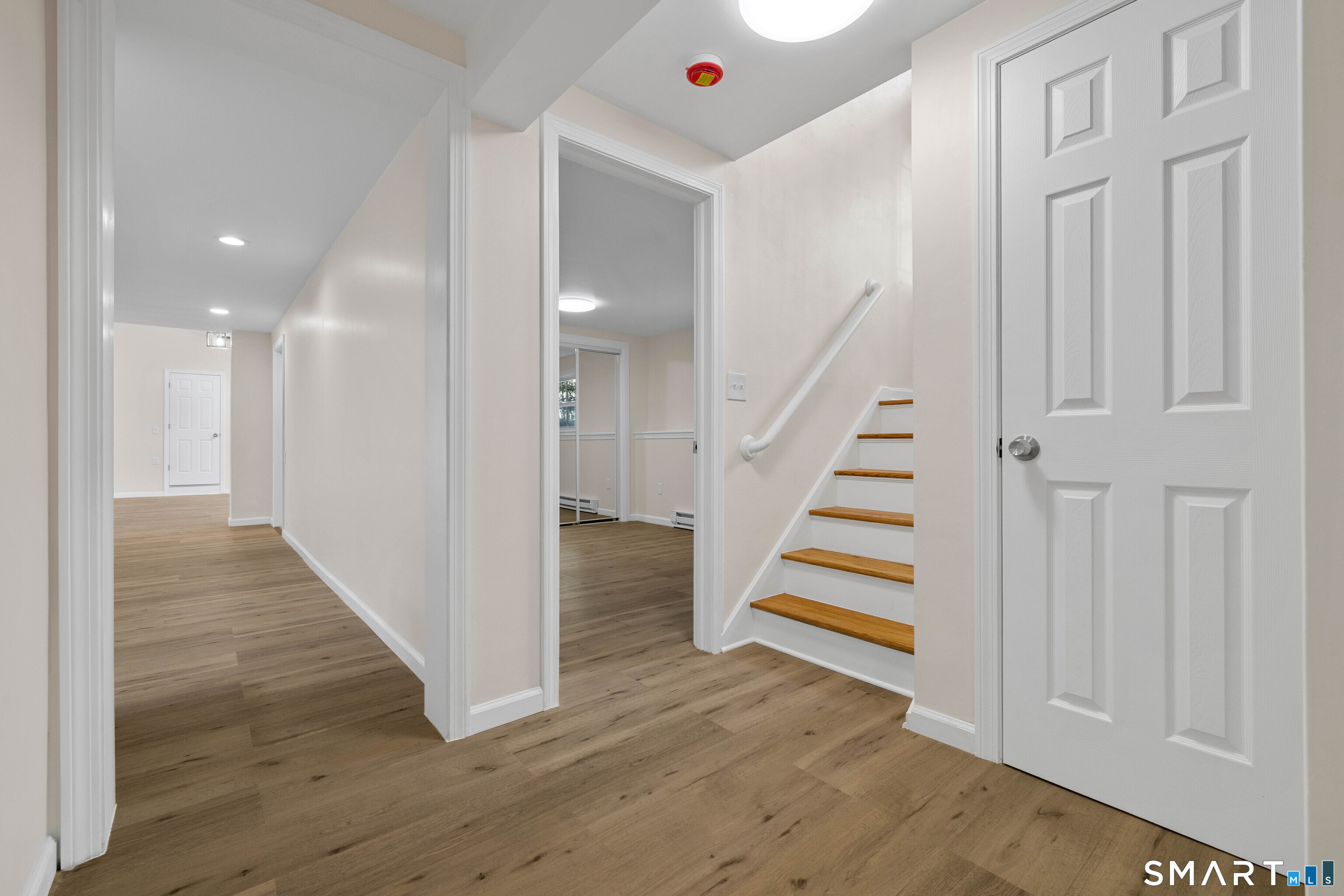 31 Branch Hill Road Preston, CT 06365 - Photo 27 of 40 a view of a hallway with wooden floor and entryway