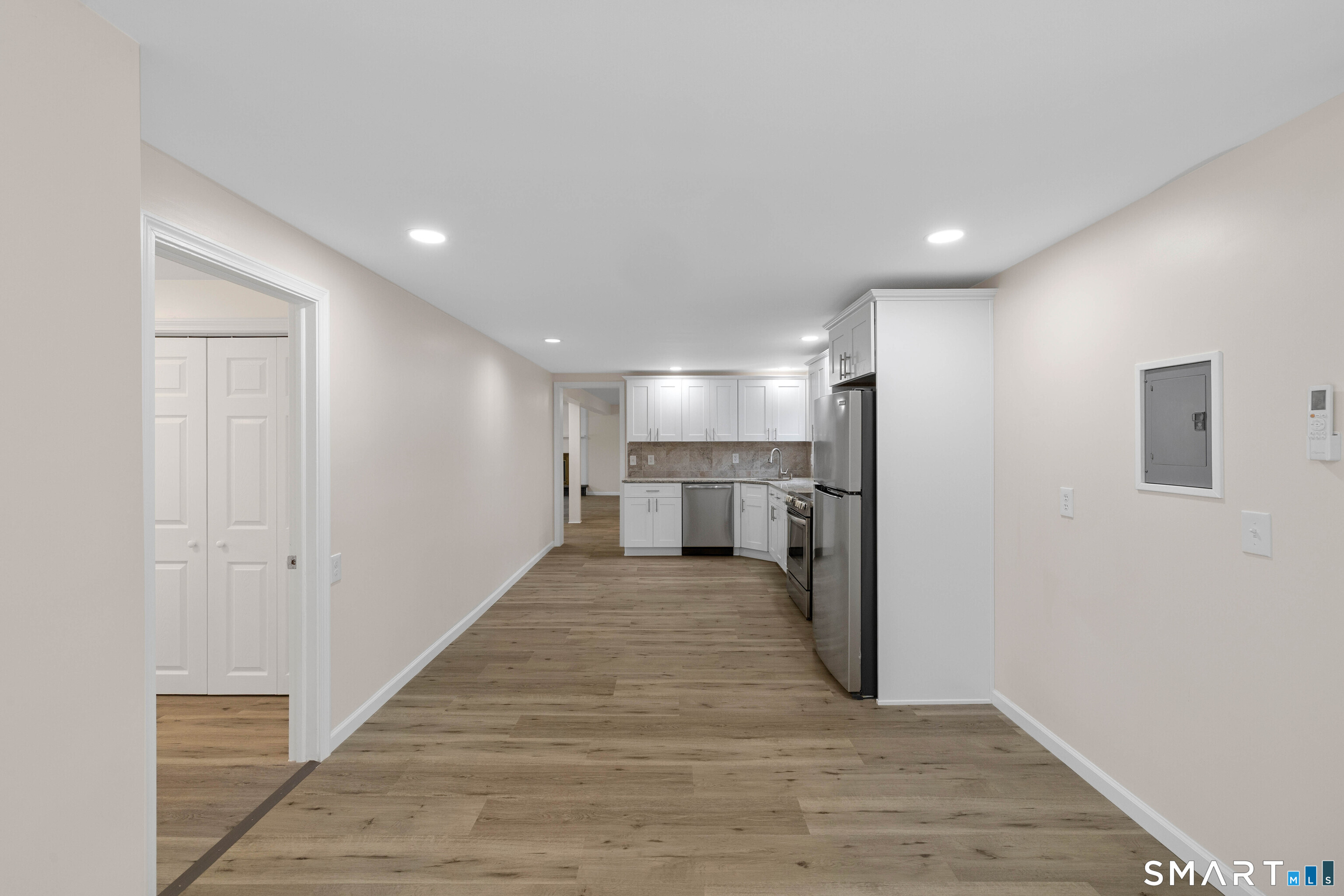 31 Branch Hill Road Preston, CT 06365 - Photo 29 of 40 a view of a kitchen with a sink and wooden floor