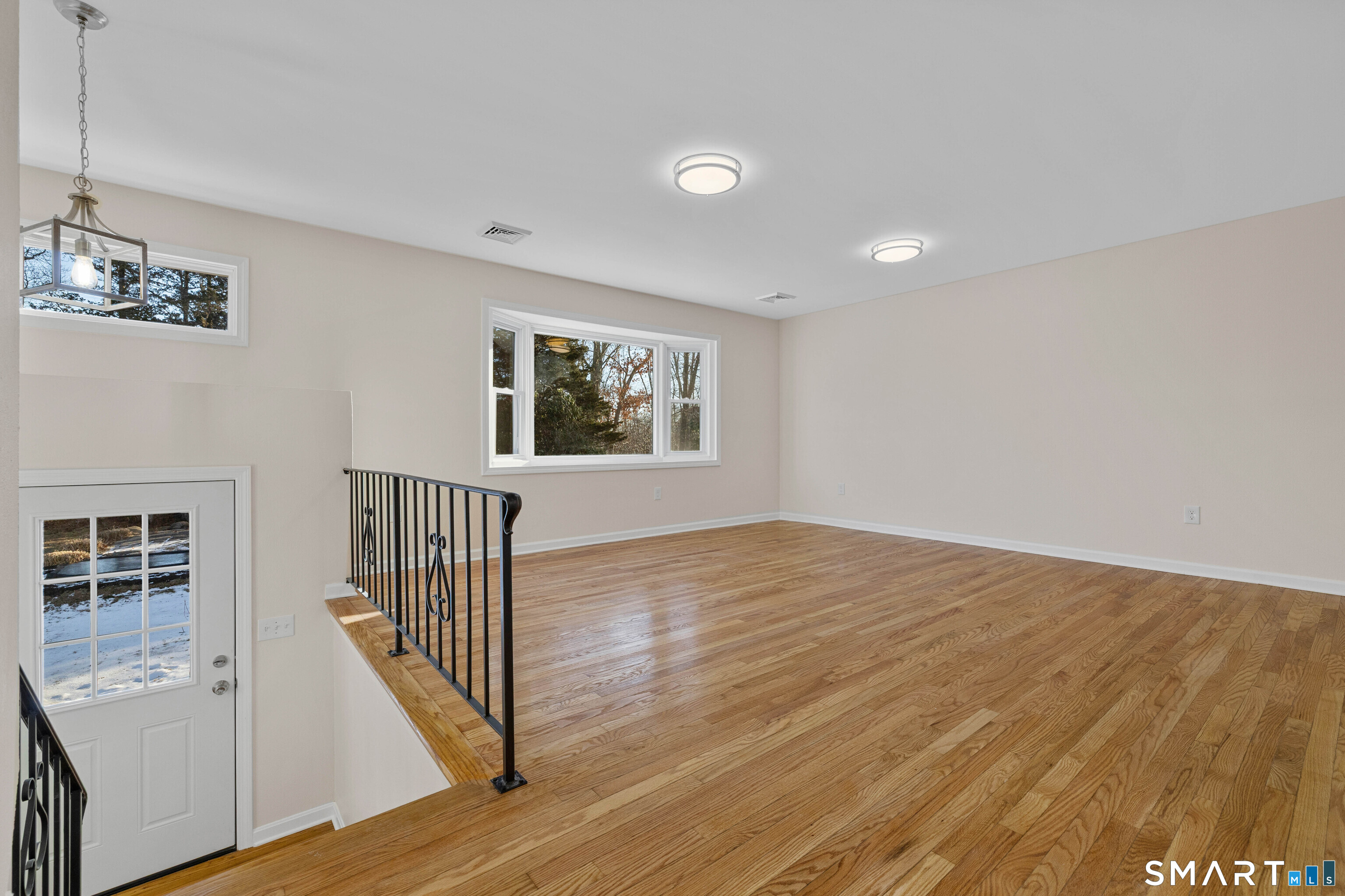 31 Branch Hill Road Preston, CT 06365 - Photo 8 of 40 a view of a hallway with wooden floor and entryway