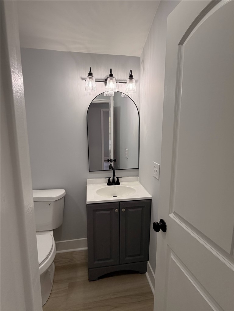 115 Hunter Street Anderson, SC 29625 - Photo 15 of 21 This bathroom features practical design with a modern vanity and ample lighting.
