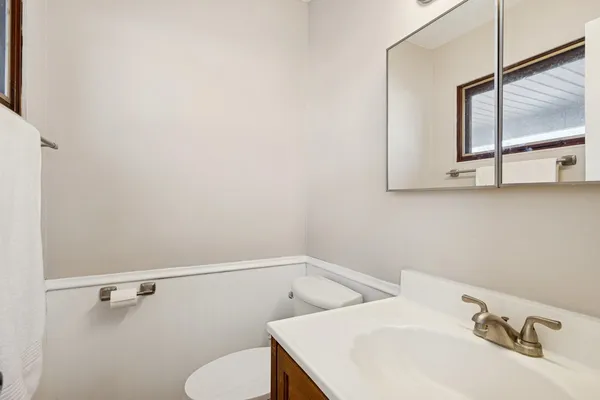 a bathroom with a sink and a toilet