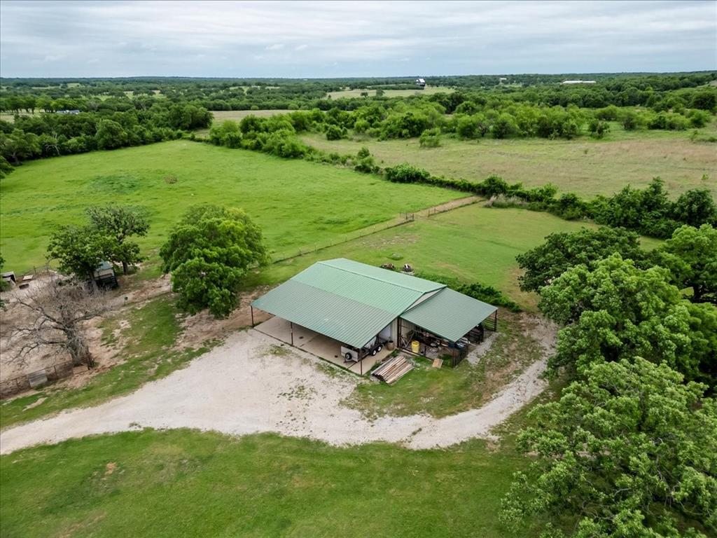 318 East Lone Star Road Poolville, TX 76487 - Photo 7 of 33 an aerial view of a house