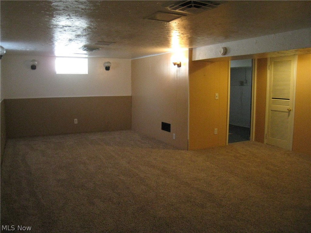 7160 Liberty Road Solon, OH 44139 - Photo 20 of 26 Here, you look into the extra room for storage, play area, office, your choice. There is also room for a 1/2 bath behind the louver door.