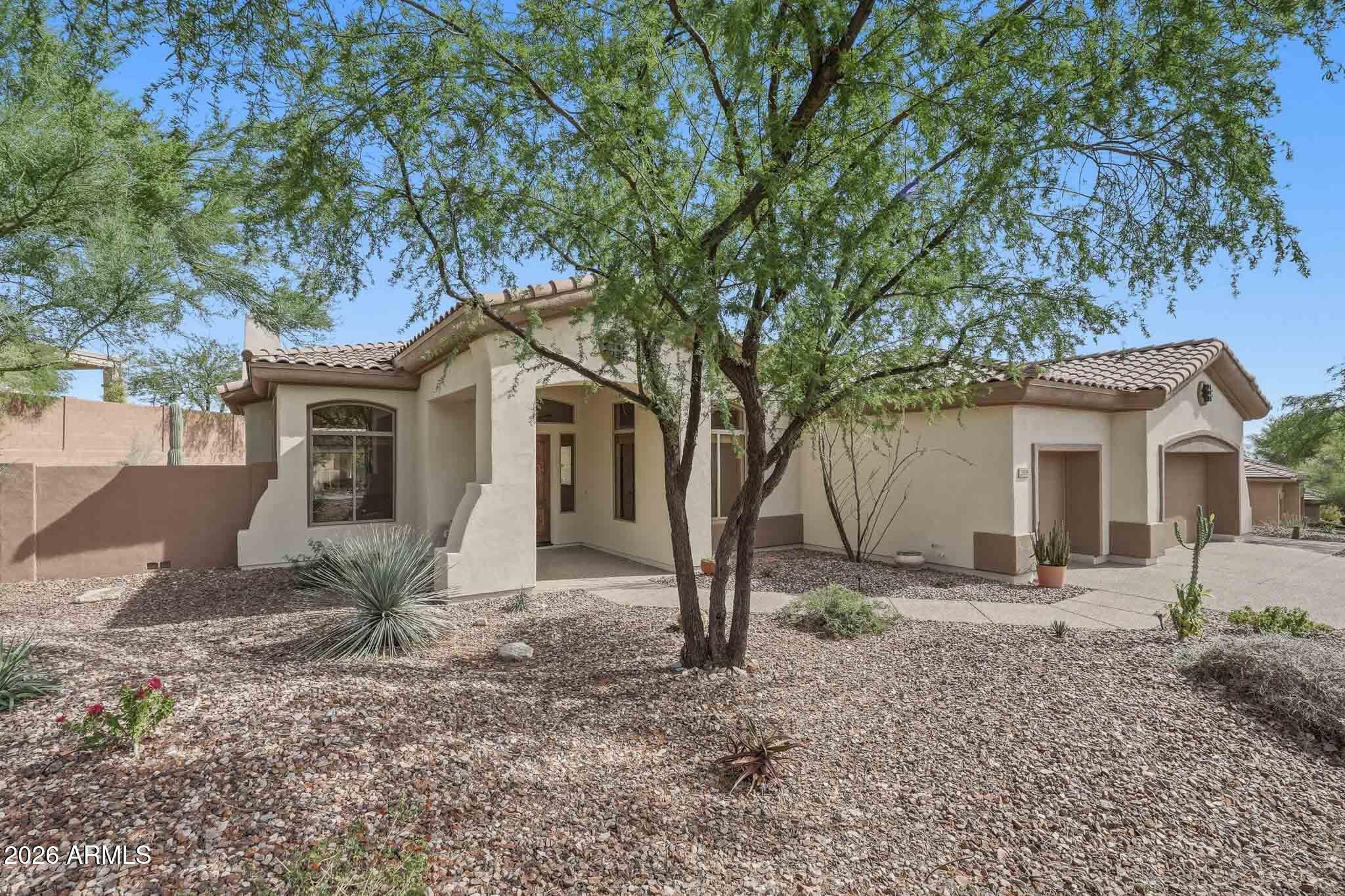 2129 West Legends Way Anthem, AZ 85086 - Photo 1 of 57 a view of a house with a yard
