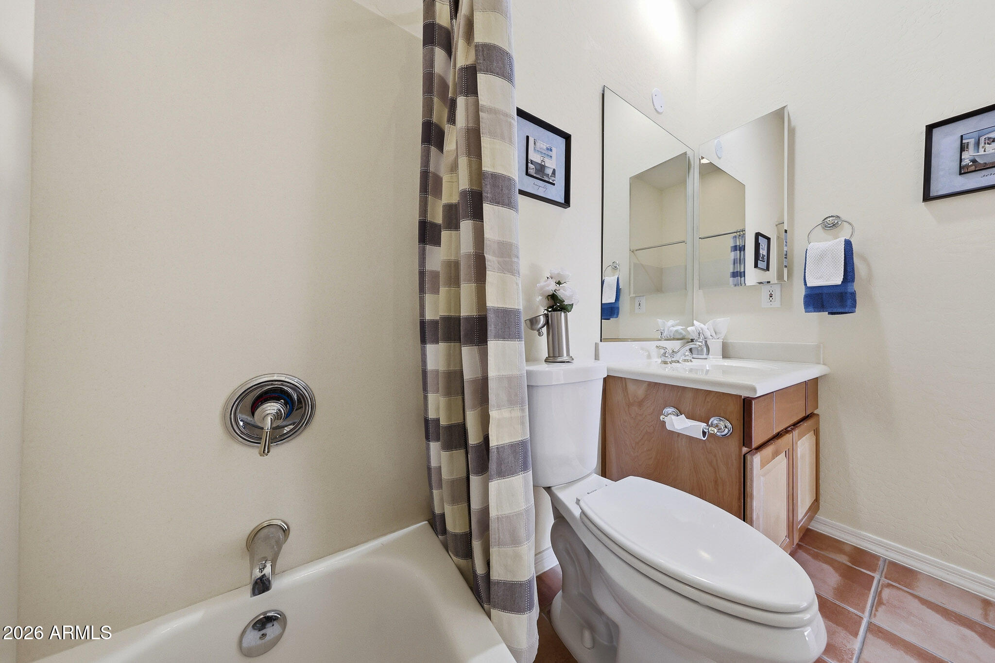 2129 West Legends Way Anthem, AZ 85086 - Photo 29 of 57 a bathroom with a sink a toilet and shower