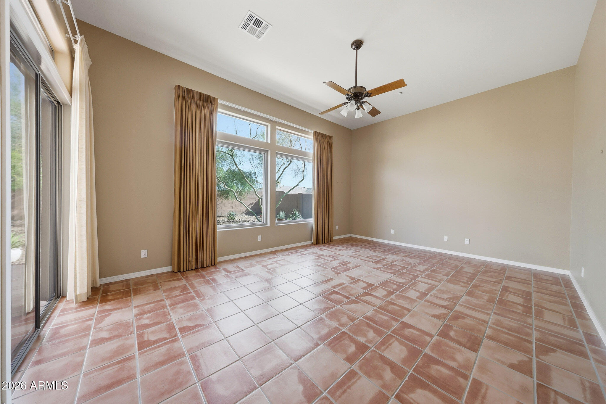 2129 West Legends Way Anthem, AZ 85086 - Photo 30 of 57 a view of an empty room with a window