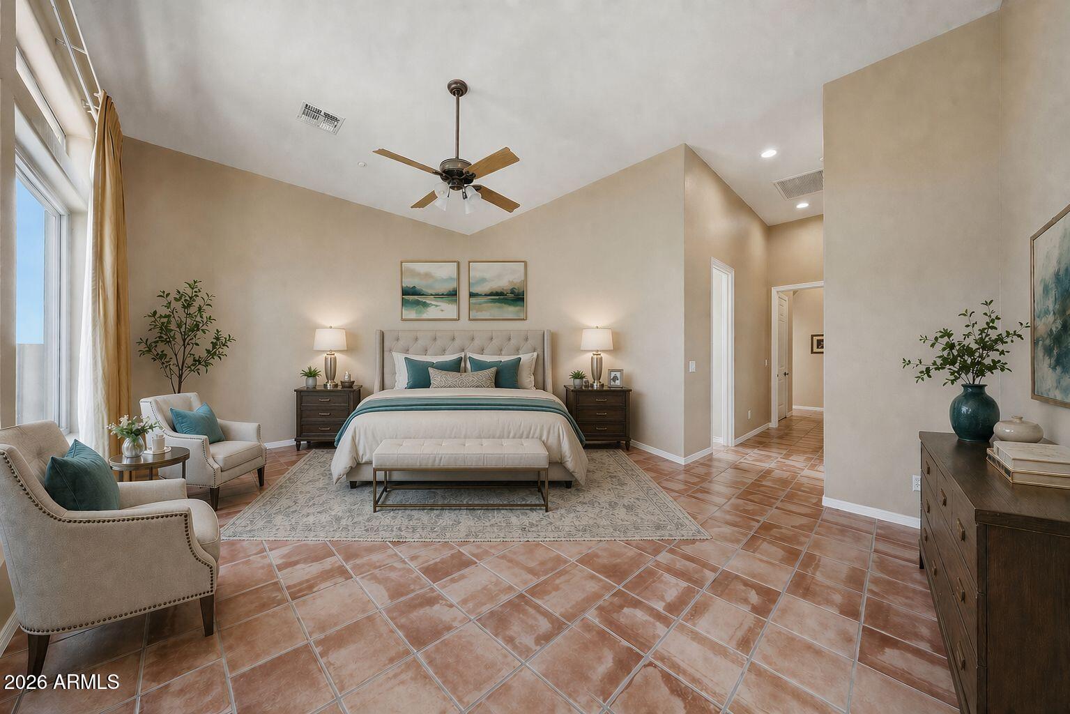 2129 West Legends Way Anthem, AZ 85086 - Photo 32 of 57 a bedroom with furniture and a chandelier
