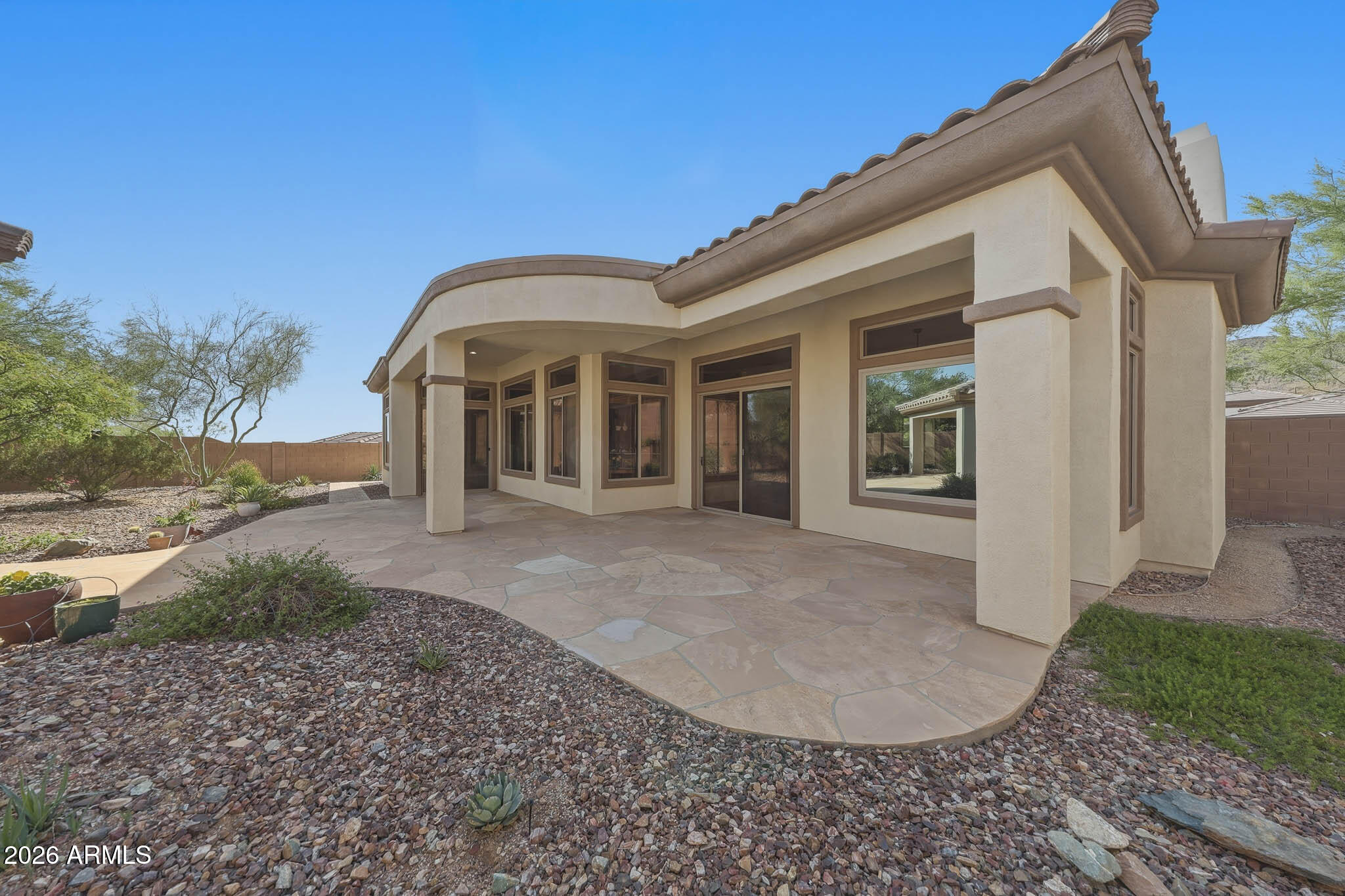 2129 West Legends Way Anthem, AZ 85086 - Photo 40 of 57 a view of a house with a backyard